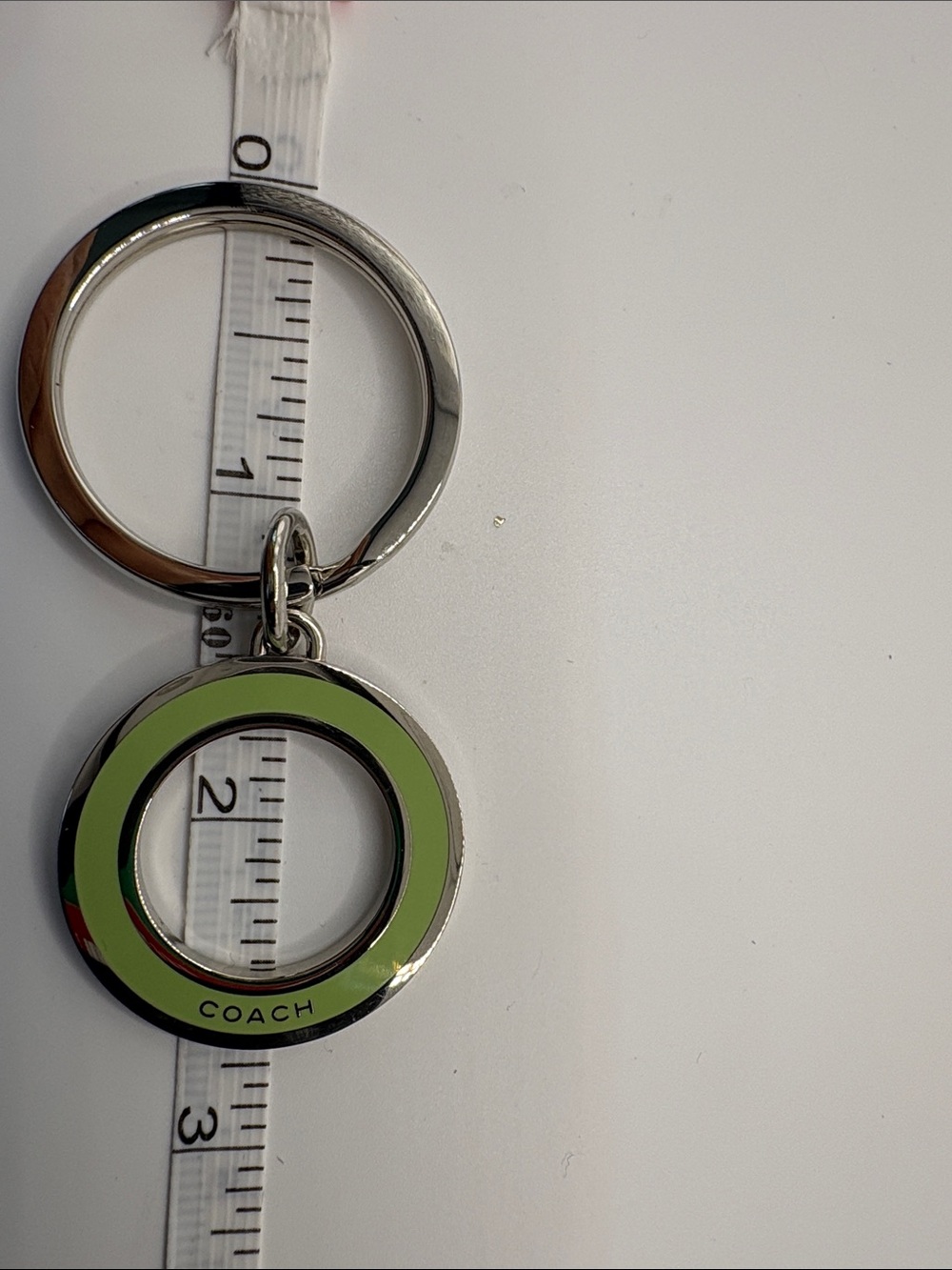 Coach Silver Keyring with Light Green Enamel Circle